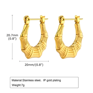 Detail view of gold-plated bamboo texture U-shaped stainless steel earrings with measurements