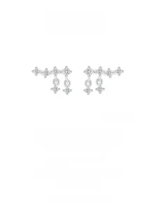 Macro detail of 925 sterling silver star fringe earrings with cubic zirconia stones