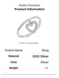 Macro shot of S925 sterling silver ring with hollow heart charm and cubic zirconia stones