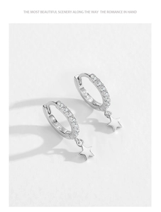 Vue détaillée des créoles en argent sterling S925 avec étoiles en zircon et poinçon S925