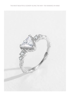 Detailed view of S925 sterling silver ring featuring triangle cut zircon and side accent gems