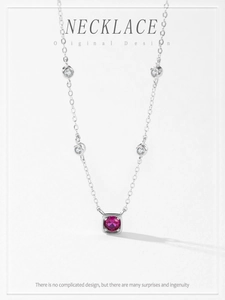 Macro view of the 925 silver necklace featuring a square red corundum and white stones