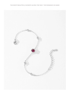 Detailed macro view of S925 silver bracelet featuring a square red zircon and adjustable clasp