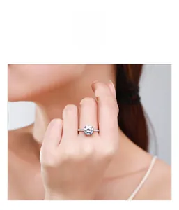 Detailed view of s925 silver ring featuring a 2-carat round diamond and pavé band