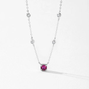 Elegant 925 sterling silver necklace with red corundum pendant and sparkling accents