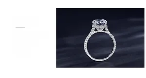 Detail of four-prong set 2-carat cubic zirconia ring with micro-pave side stones