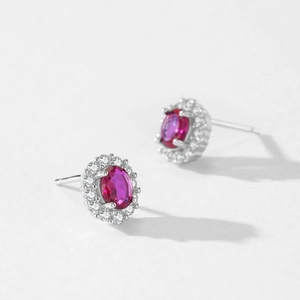 Luxury S925 silver halo stud earrings featuring oval red zircon and diamond accents