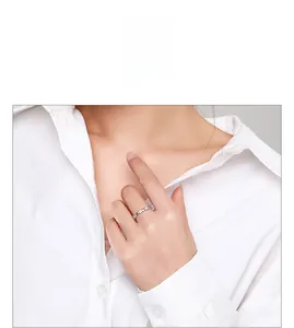 Close-up of s925 silver star ring on model finger showing elegant cutout patterns