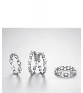 Detailed macro view of S925 sterling silver rings with heart, star and chain zircon patterns
