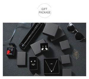 Luxury black jewelry gift boxes featuring elegant velvet lining and premium textures