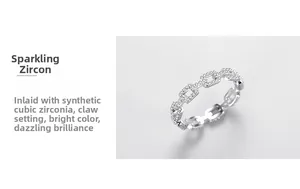 Detail of S925 sterling silver chain ring with cubic zirconia and prong setting