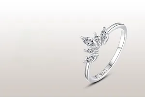 Macro shot of S925 sterling silver stamp and sparkling tiara crown gems on the ring