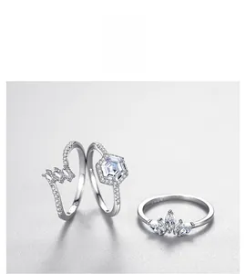 Macro shot of S925 sterling silver princess crown ring set with shimmering zircon stones