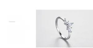 Close-up of S925 sterling silver crown ring featuring polished finish and marquise-cut stones