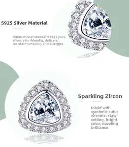 Detailed view of S925 sterling silver triangle stud earrings with shimmering zircon pavé
