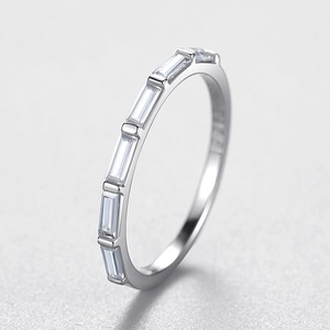 S925 sterling silver ring featuring minimalist baguette-cut cubic zirconia in a half-band