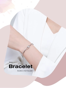 Detail view of s925 silver bracelet with sparkling zircon stones worn on wrist