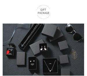 Minimalist black gift boxes for jewelry including necklace and ring boxes with flocking liner