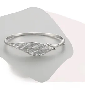 Detailed macro shot of S925 sterling silver leaf bracelet featuring inlaid zircons