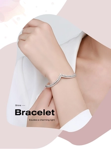 Close-up of S925 silver V-shaped crown bracelet with sparkling zircons on wrist