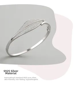 Detailed view of leaf design with micro-pave zirconia on S925 sterling silver bangle