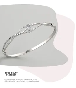 Detailed macro view of S925 sterling silver floral bangle with sparkling zircon clusters