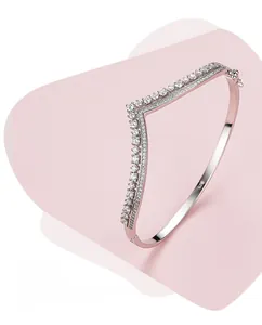 Macro shot of S925 sterling silver stamp and zircon crown detail on the V-shaped bangle