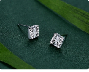 Macro detail of square-cut crystals set in S925 sterling silver minimalist earrings