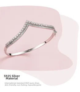 Close-up of S925 sterling silver V-shaped crown bracelet with sparkling pavé cubic zirconia