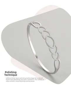 Detail of S925 silver bangle featuring hollow leaf design and three-layer polished finish