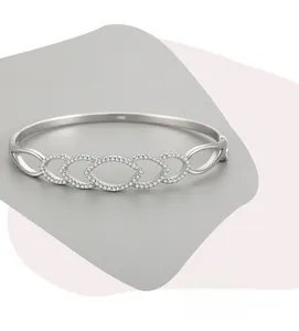Detailed shot of S925 silver link bracelet featuring micro-paved cubic zirconia accents