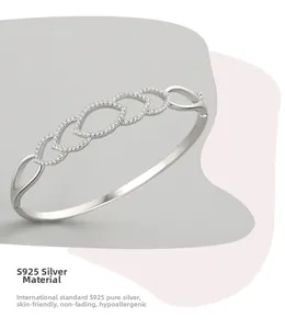 Detailed macro of S925 sterling silver hollow chain bracelet with luxury pavé diamonds