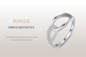 Detailed view of S925 sterling silver ring featuring a micro-paved interlocking cross design