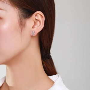 Elegant S925 silver square geometric earrings with pavé zircons worn by model