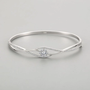 Elegant S925 silver open bangle with a minimalist intertwined floral wave design and zircons