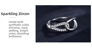 Detail of s925 silver cross ring with pavé cubic zirconia in claw setting