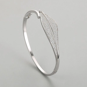 Elegant S925 sterling silver leaf open bangle with shimmering cubic zirconia stones