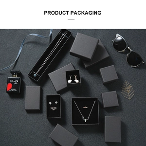 Black matte paper jewelry gift box set including necklace, earring, and ring packaging