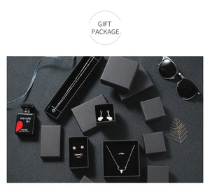 Elegant black textured gift package set showcasing minimalist s925 silver jewelry designs