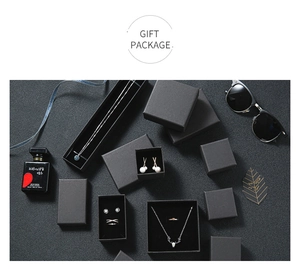 Detailed gift packaging set with matte black jewelry boxes for silver necklaces and rings