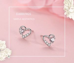 Close-up of heart earrings in S925 silver with lavender stones and zircon accents