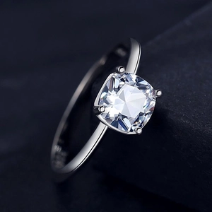 Elegant S925 sterling silver ring with 1ct cushion-cut moissanite stone on dark stone base