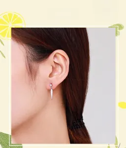 Close-up of S925 sterling silver geometric drop earring with square cubic zirconia stone