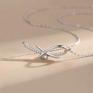Elegant S925 silver infinity necklace with micro-pave crystals on a fine link chain