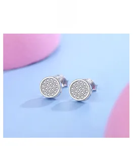 Detailed close-up of S925 silver round stud earrings with micro-pave crystal zircons