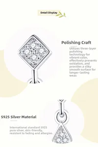 Detailed view of polished S925 sterling silver drop earrings with geometric zircons