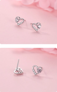Close-up of S925 sterling silver heart studs with pink gemstone and white diamonds
