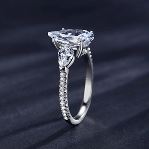 Luxurious S925 silver pear-cut three-stone ring with pavé-set diamond accents