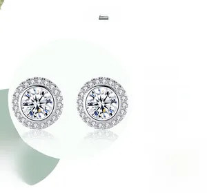 Detailed view of polished S925 sterling silver stud earrings with round brilliant cubic zirconia