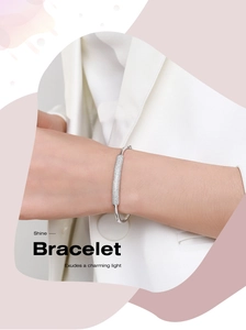 Detailed close-up of s925 silver bamboo bangle with pavé-set crystals on model's wrist